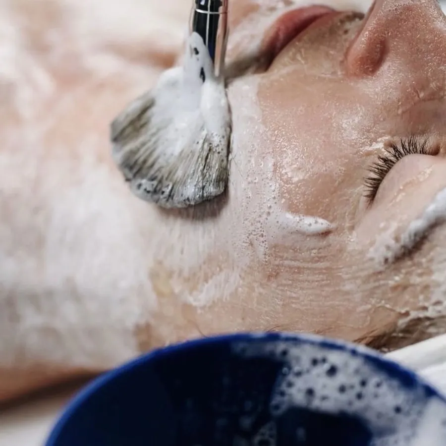 Oxygen gel being applied with a brush during a Circadia facial